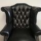Fauteuil bergère chesterfield cuir noir