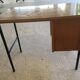 Desk with drawers and tubular metal feet