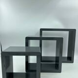 3 nesting shelves in grey lacquer.