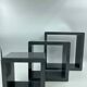3 nesting shelves in grey lacquer.