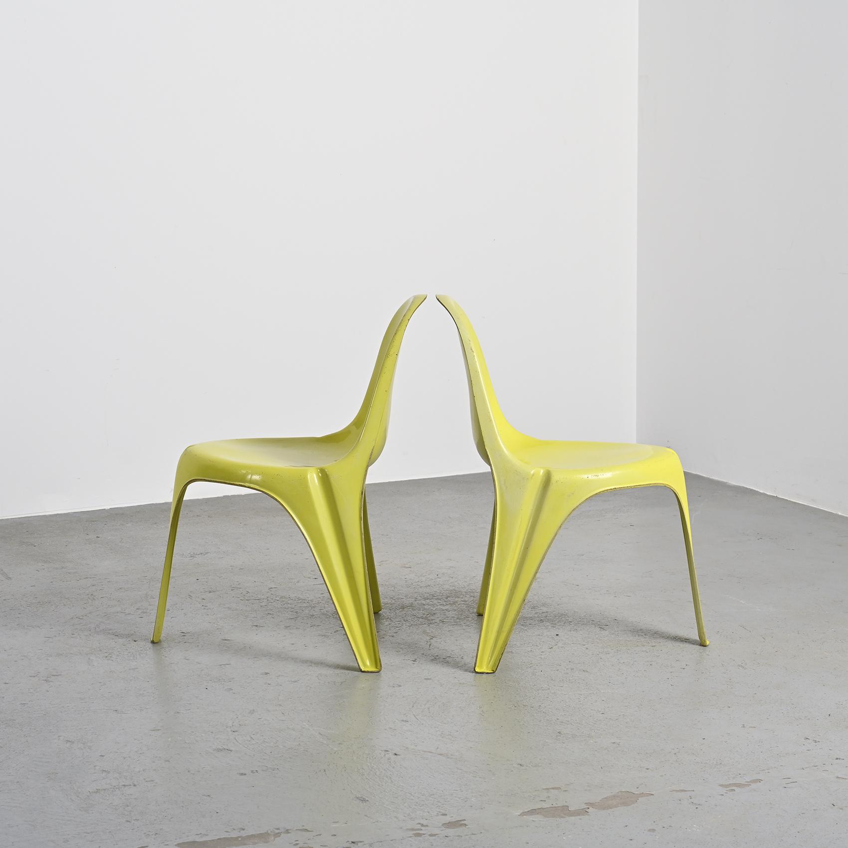 Pair of yellow fiberglass tripod chairs by Walter Frey, circa 1968