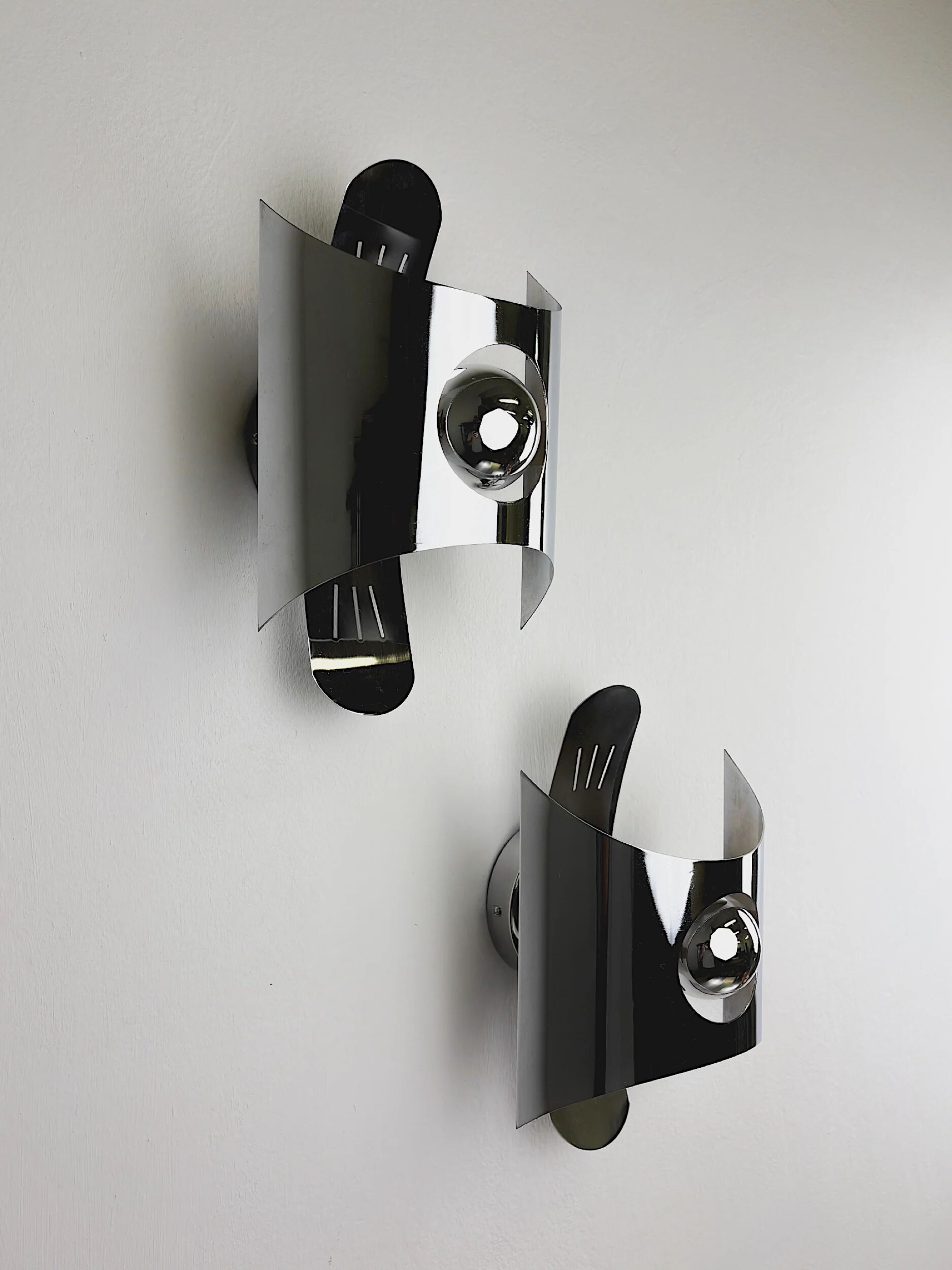Pair of chromed space age wall lights, Italy, 1970s