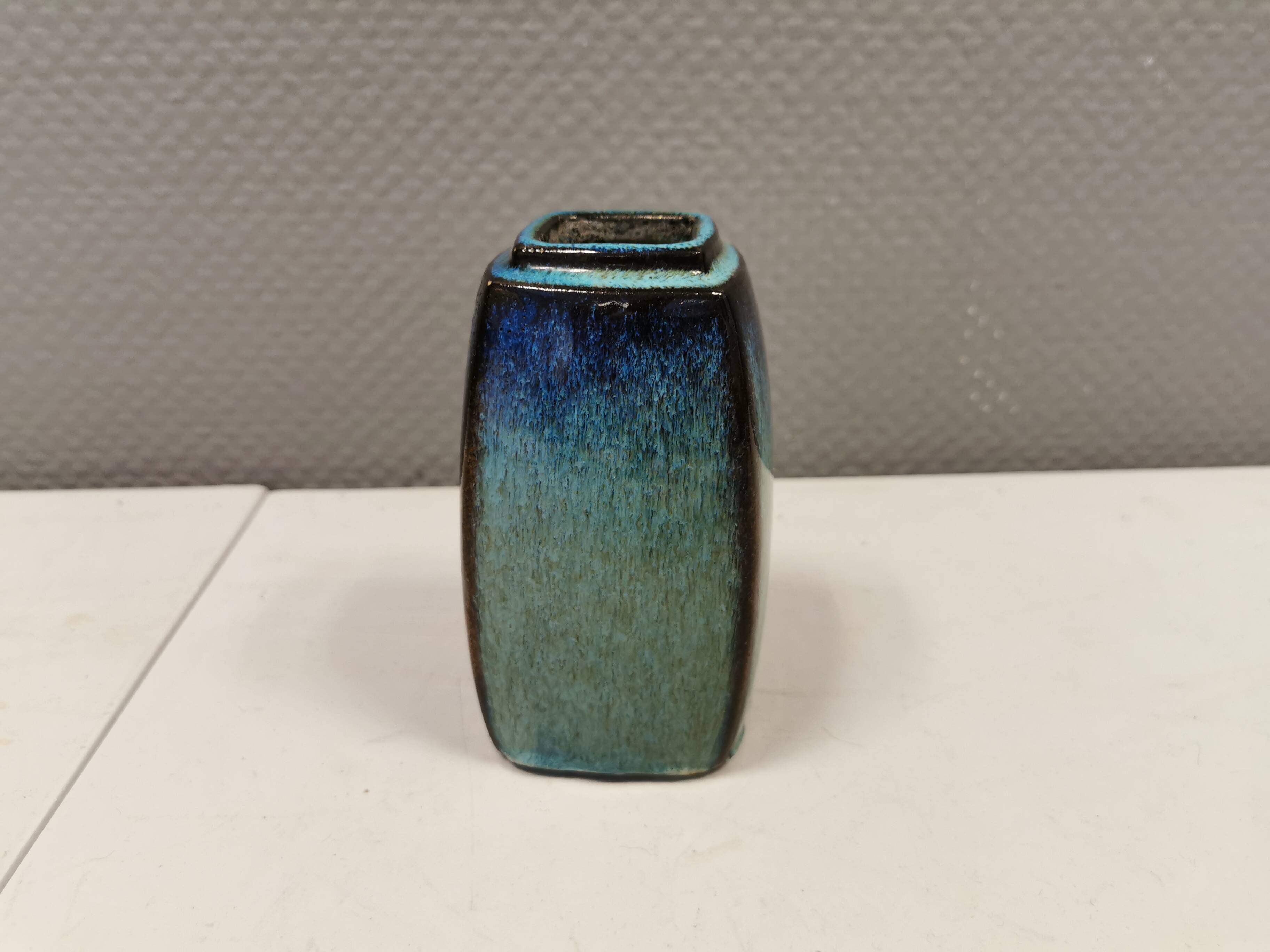 Vase in several shades of blue, from Danish Stogo art pottery. Estimated 1970-1980s