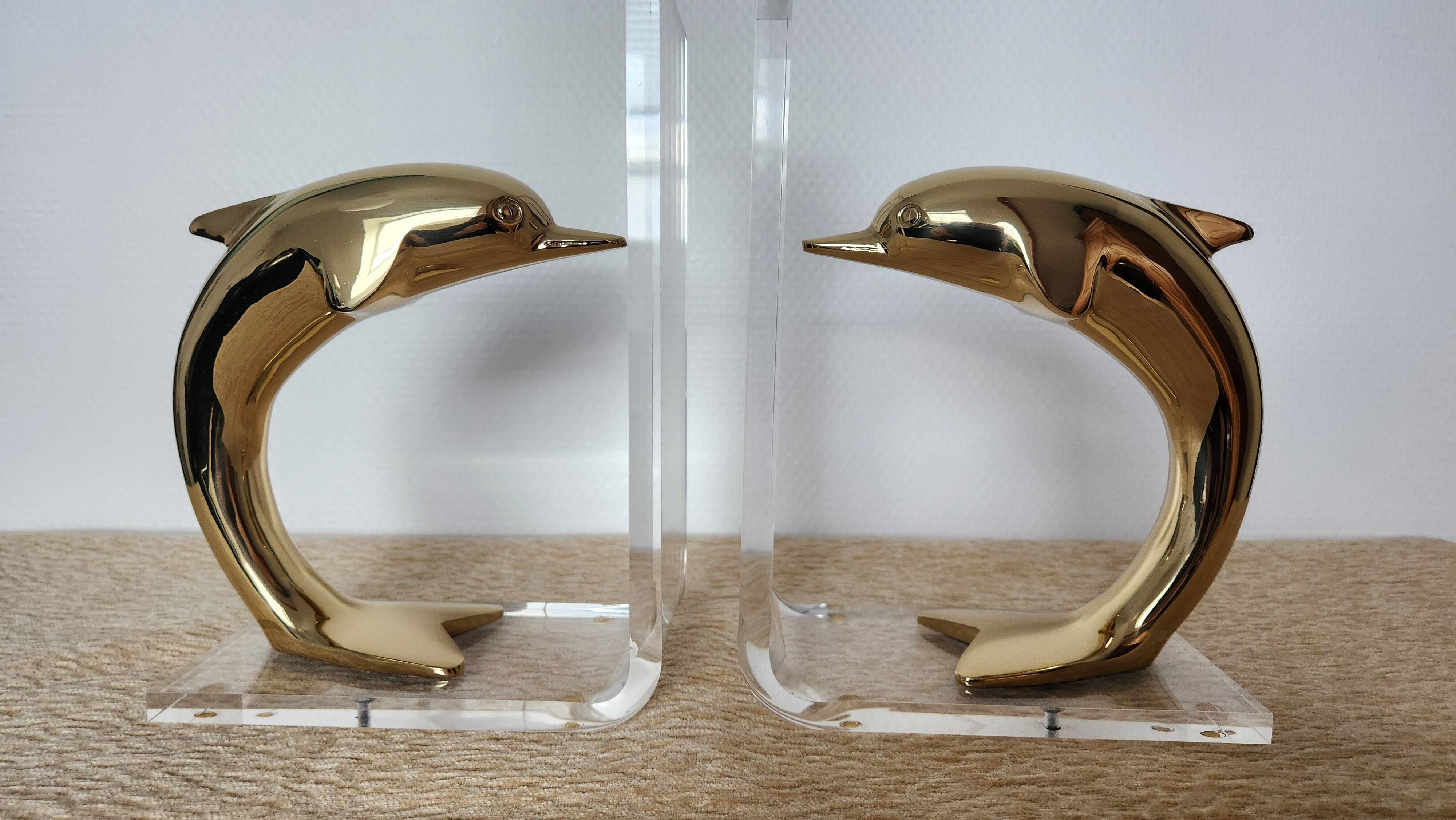 Dolphin bookends in gold metal and plexiglass – 1980s