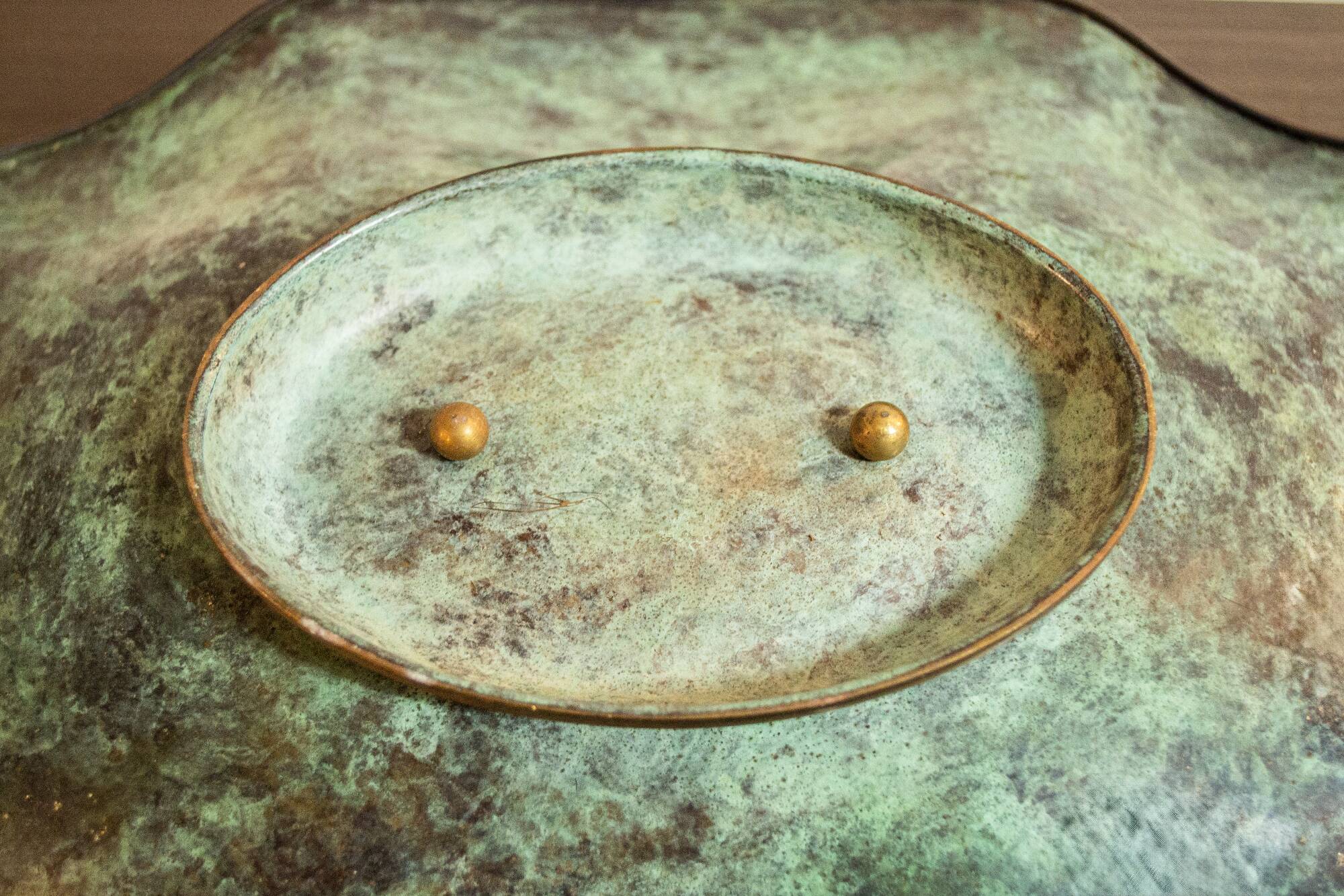 Fruit holder in oxidised brass with floral decoration, Italy 1940s