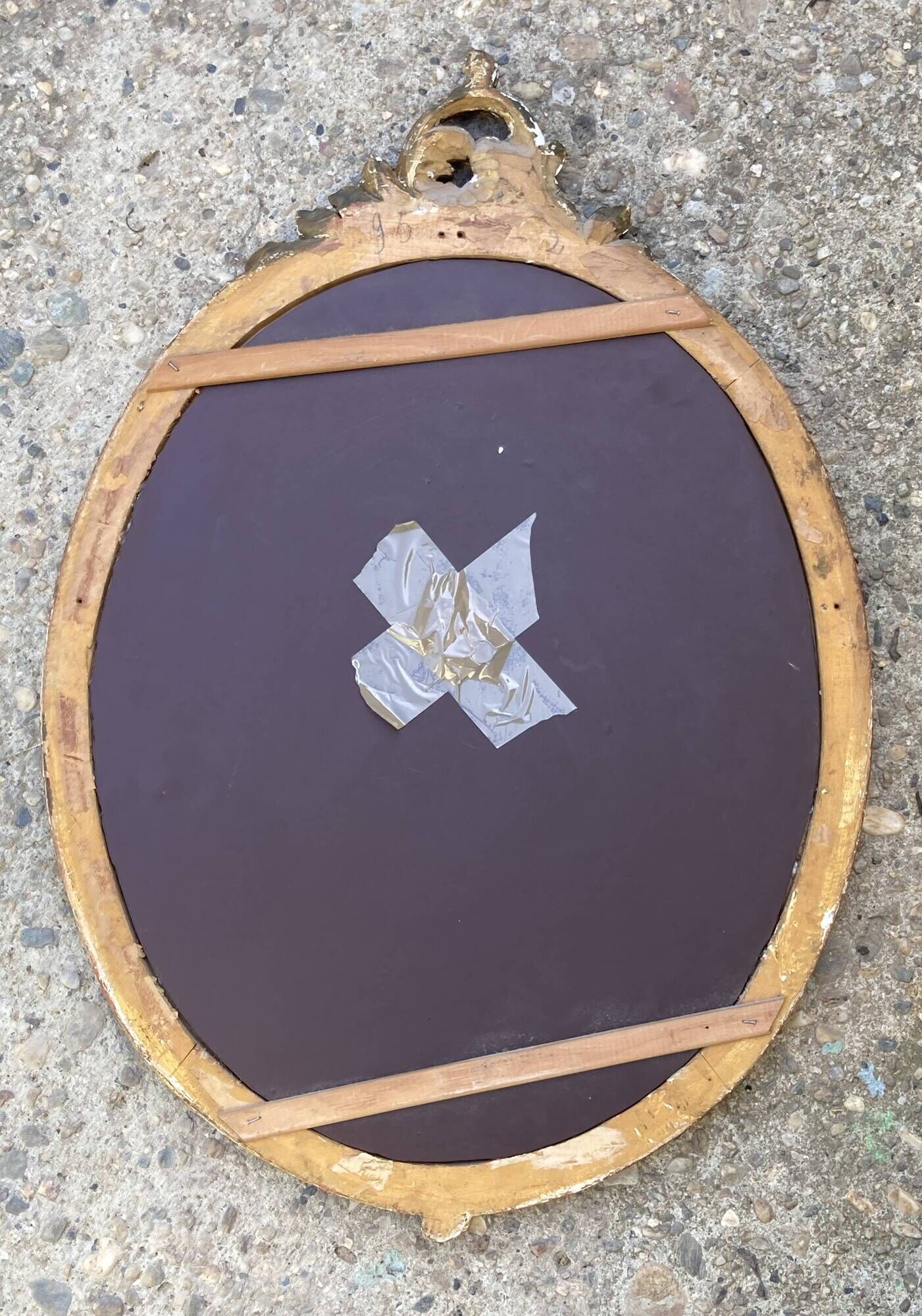 Oval mirror - wood and gilded stucco with decoration of
