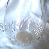 Crystal pitcher engraved with petals