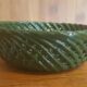 Vintage pocket empty cup in green braided ceramic basket style