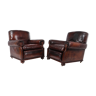 Antique leather club armchairs by Maple and Co 1910