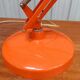 Luxo L4 vintage orange lamp with foot