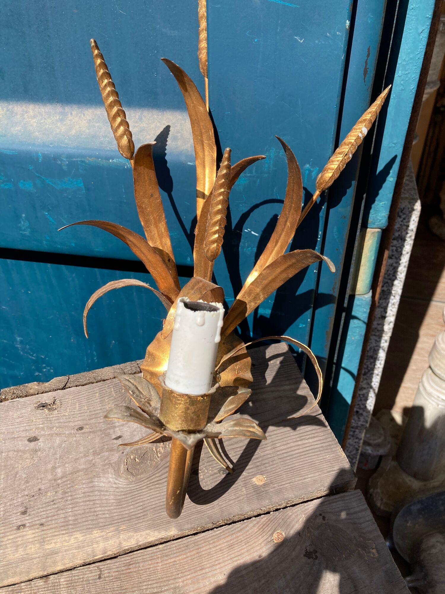 Pair of gold metal sconces decorated with wheat cob