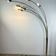 Italian Arc floor lamp with 6 lights in gold brass, 1970s.