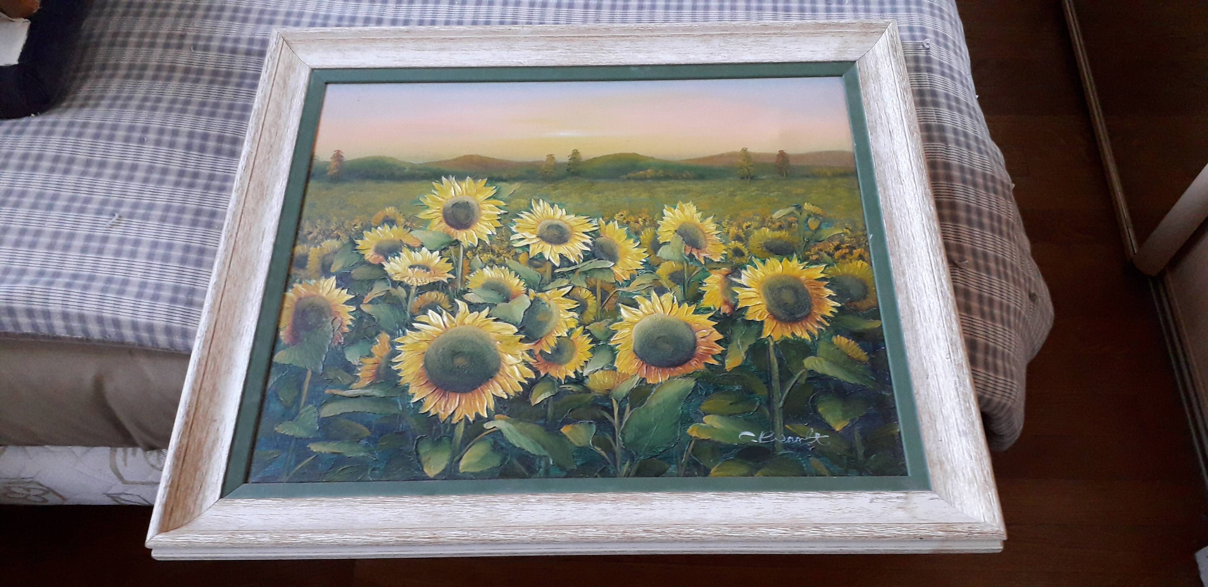 Old oil painting depicting a landscape of sunflowers