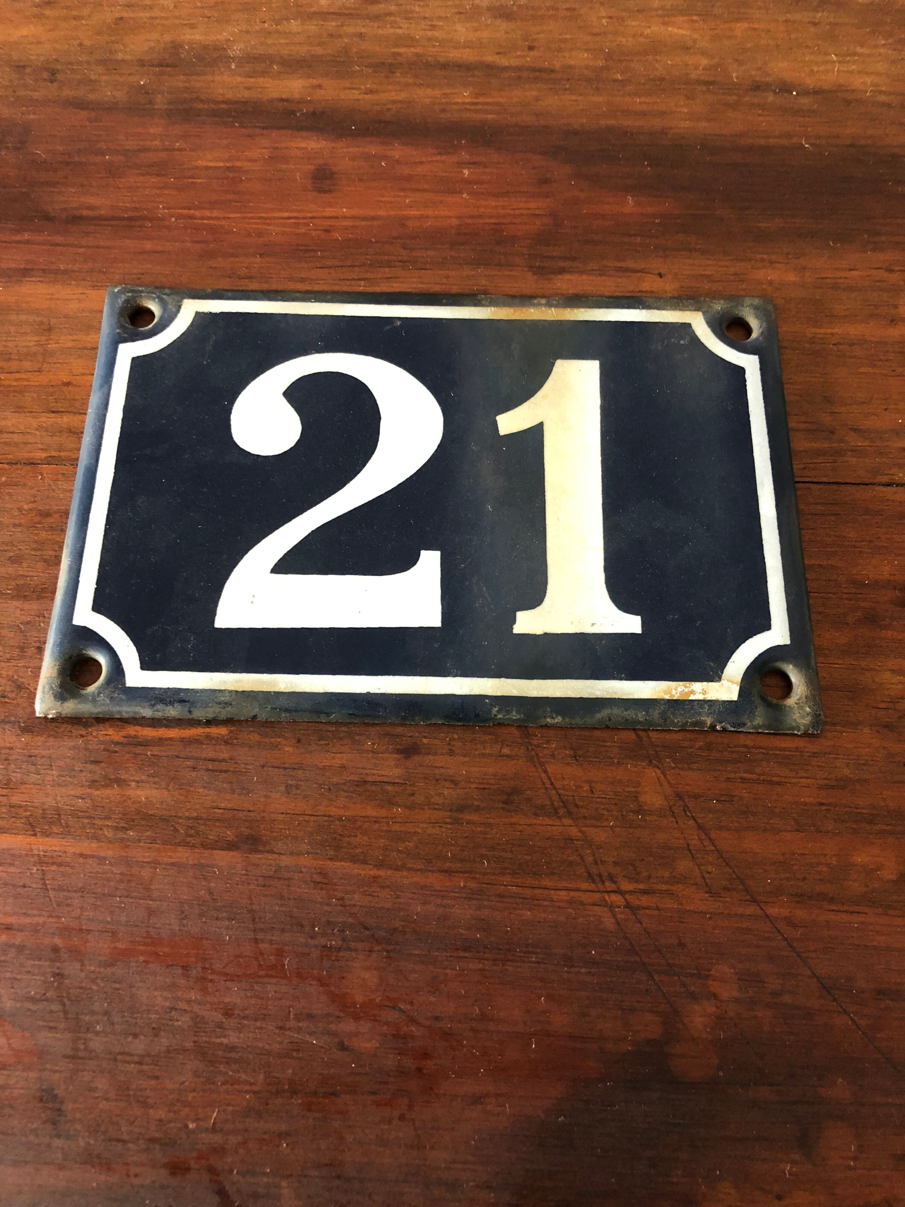 Old enamelled plate number 21