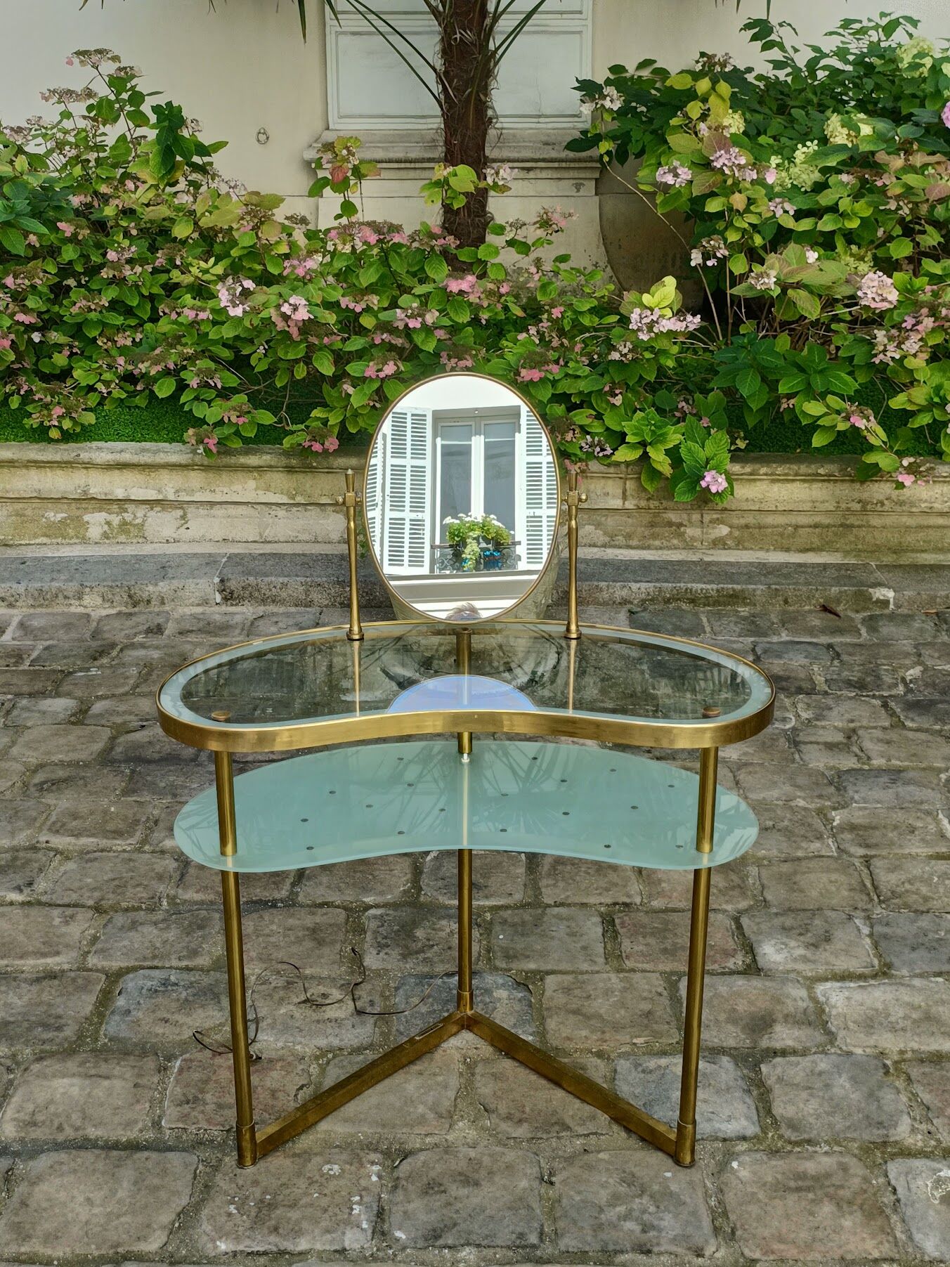 Brass and glass dressing table, with mirror, lighting and steering wheel, by Luigi Brusotti - 1940