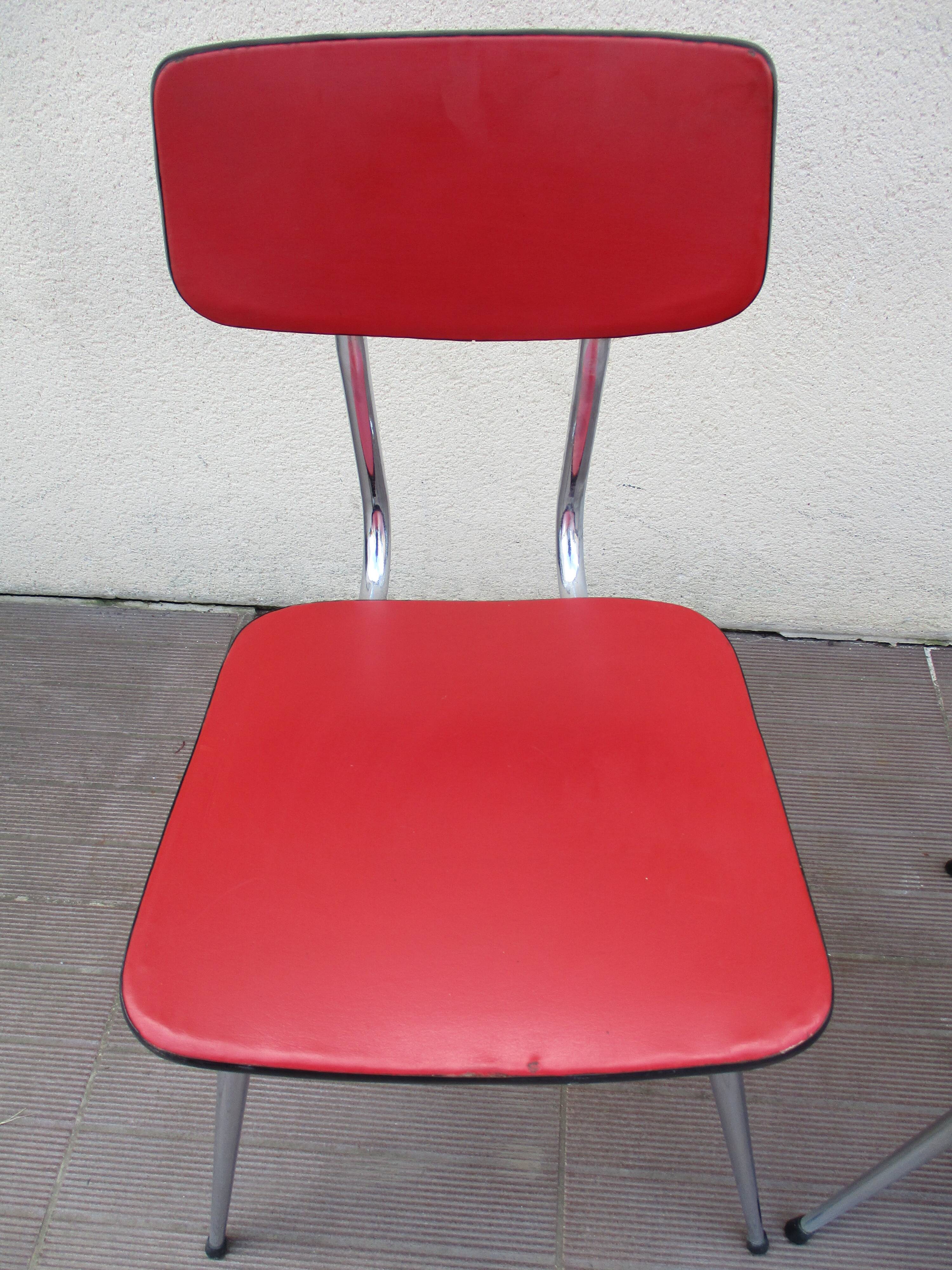 2 red chairs vintage