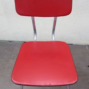 2 red chairs vintage