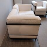 A sofa and two LC2 Cassina armchairs