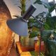 Chrome metal desk lamp and gray articulated arm
