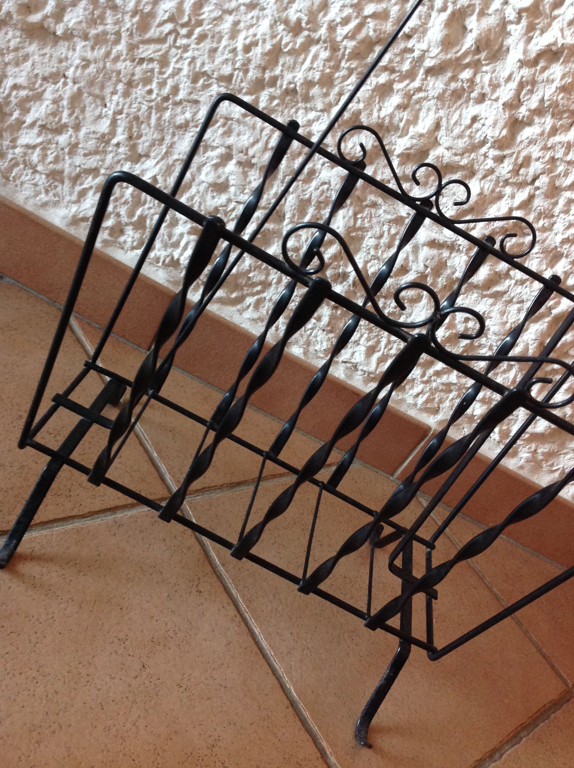Black metal magazine holder