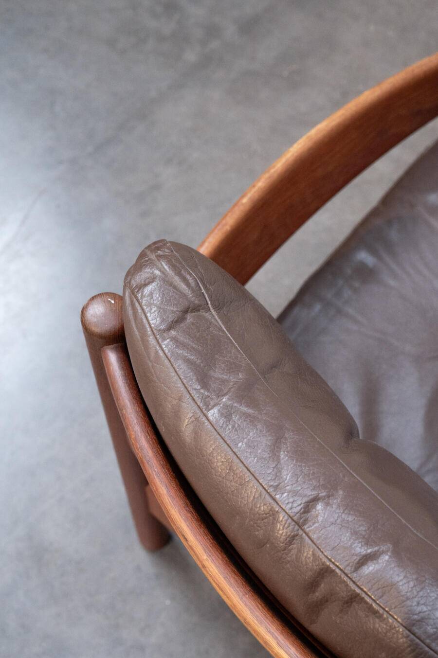 Teak and leather armchair