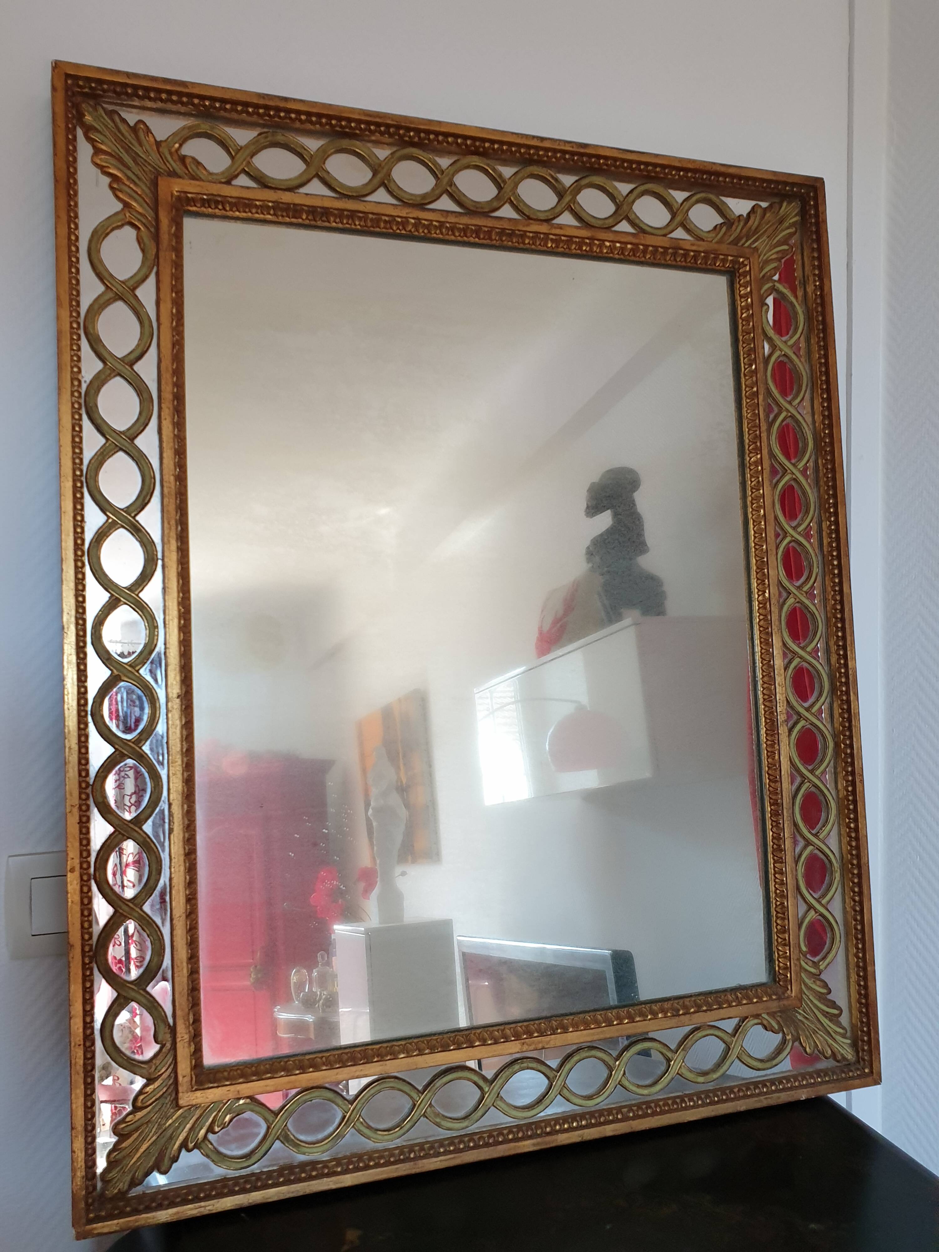 Classic antique mirror in gilded wood
