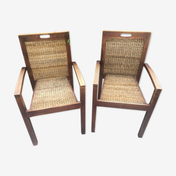 Pair of teak armchairs and braided wicker