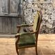 Antique Voltaire armchair in wood and green velvet Louis Philippe