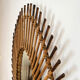 Rattan mirror in the shape of an eye