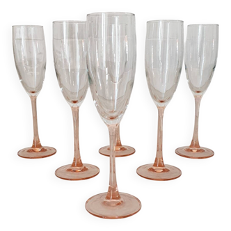 6 champagne flutes with pink stems