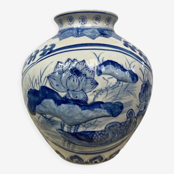 Chinese vase in blue-white porcelain decorated with lotus flowers