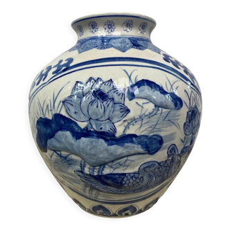 Chinese vase in blue-white porcelain decorated with lotus flowers