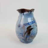 Large blue pitcher with abstract pattern