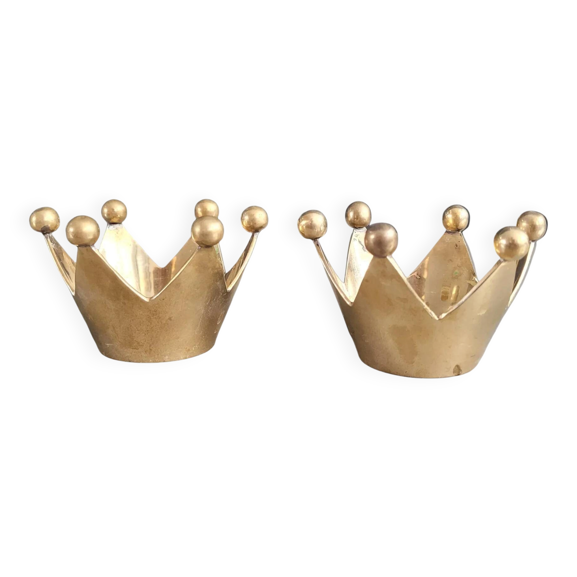 Pair of crown candle holders in brass