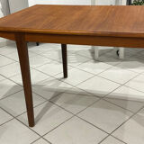 Large extendable Scandinavian table in vintage teak from the 1970s.