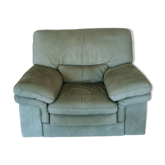 Armchair in green leather