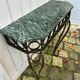 Console in wrought and hammered iron and green marble