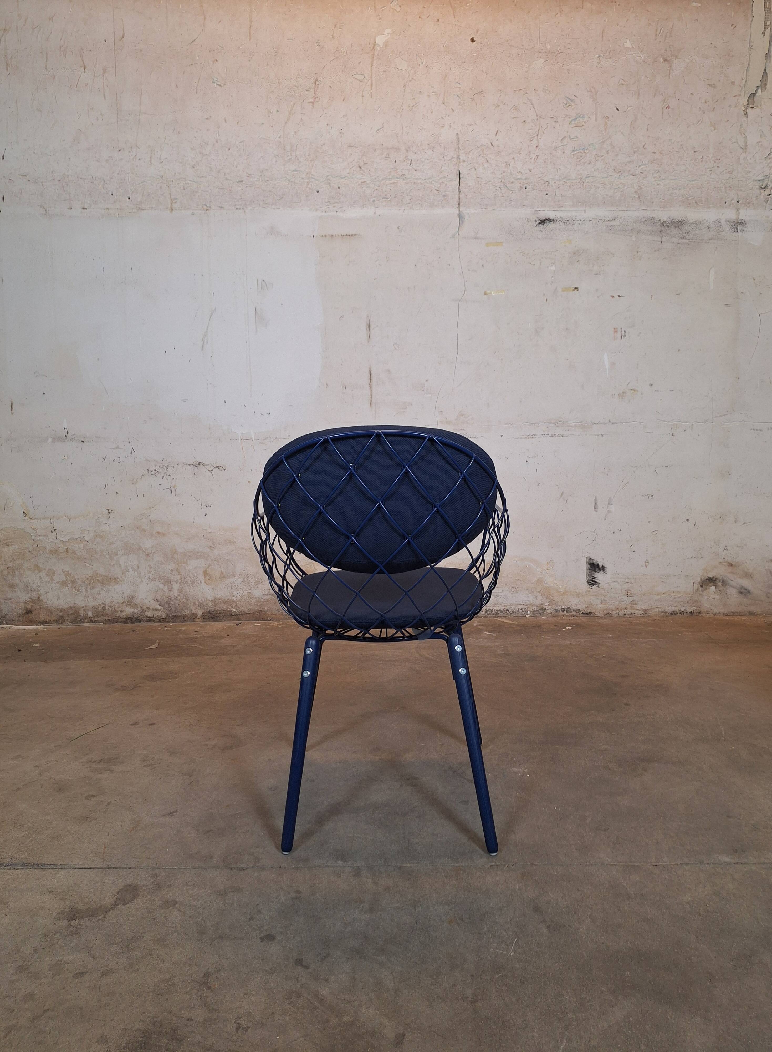 Magis Piña blue chair with metal frame and padded seat