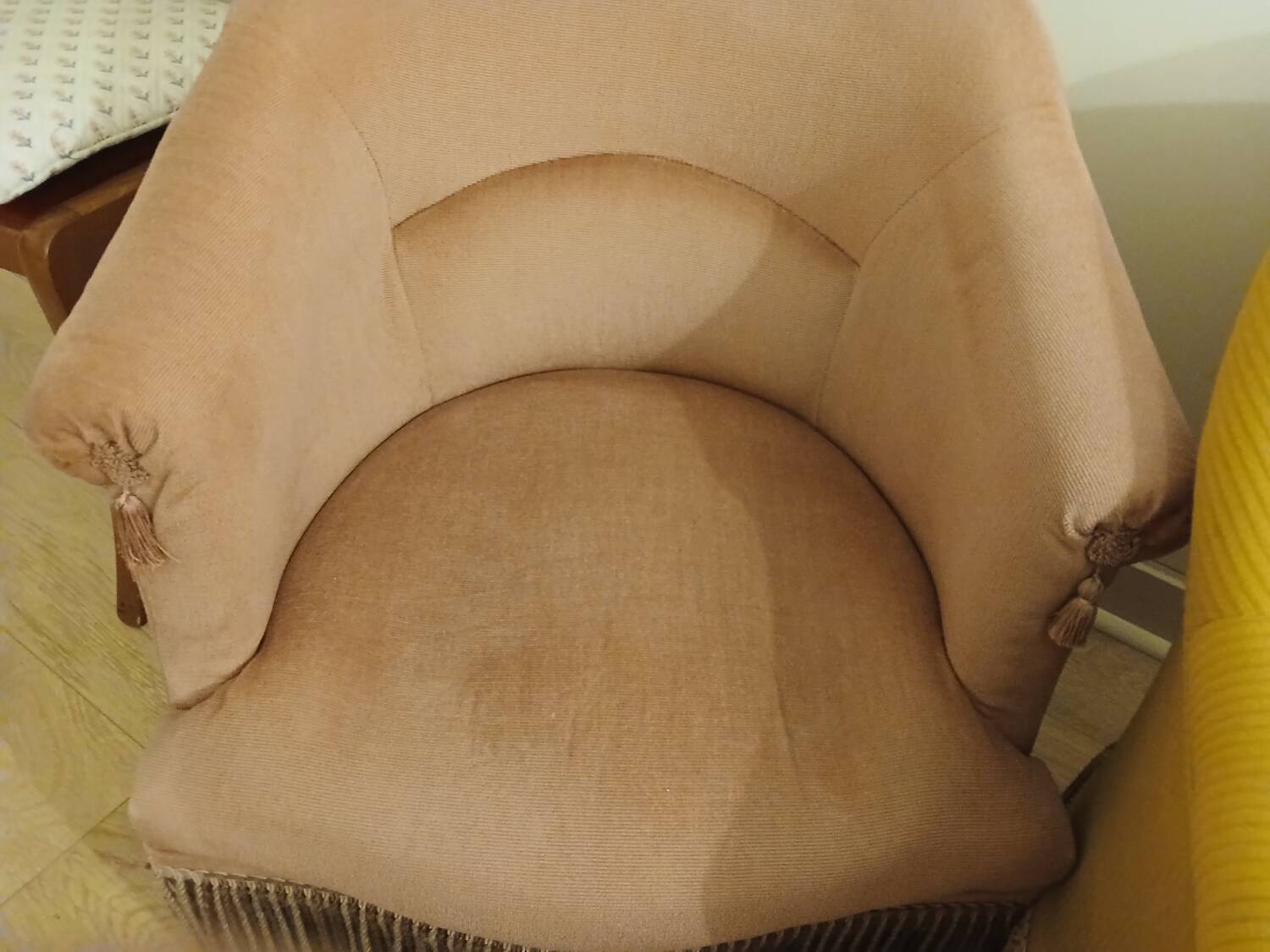 Set of 2 yellow and pink velvet tub chairs.