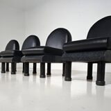 Black leather loungers , 1980.