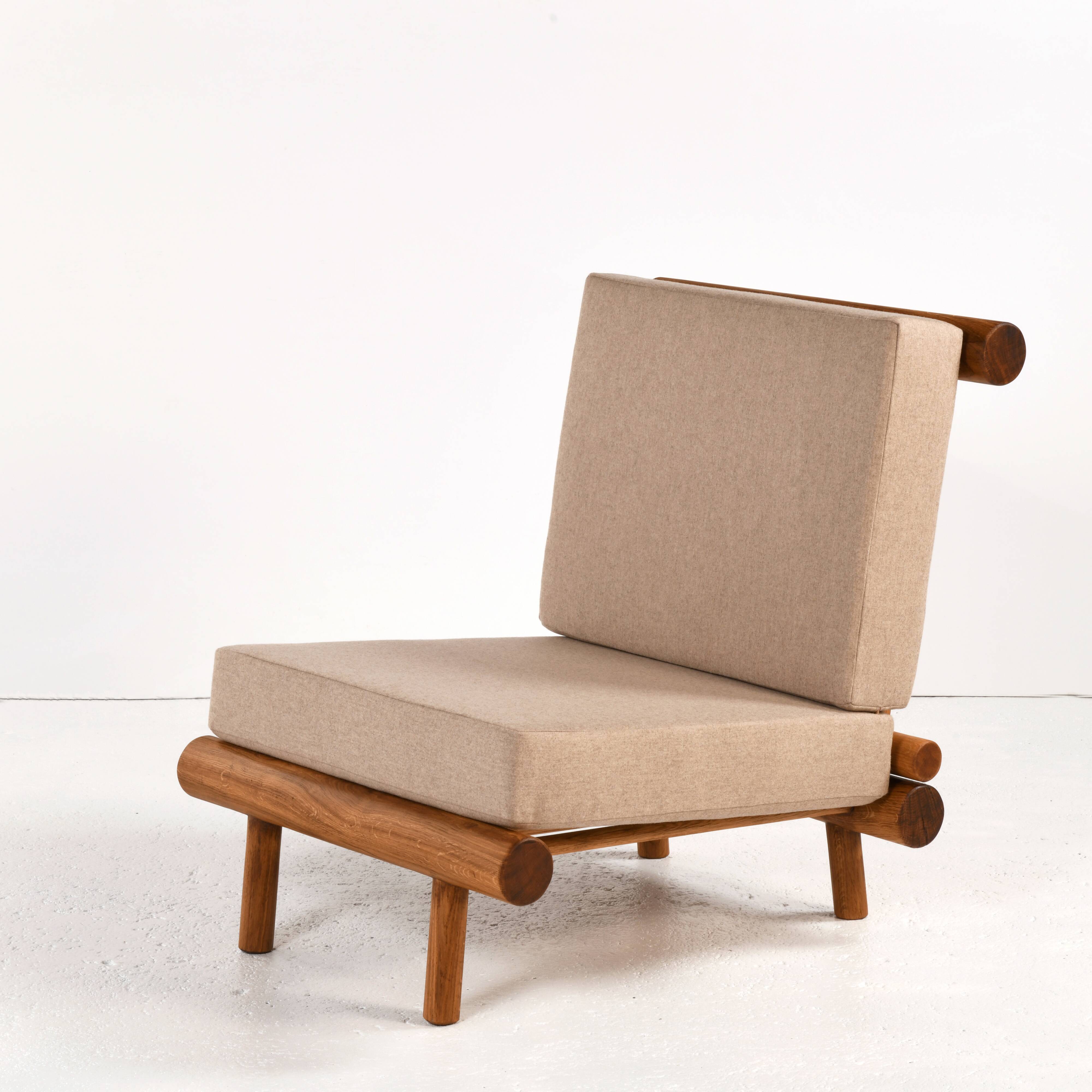 Pair of low chairs called La cachette selected by Charlotte Perriand