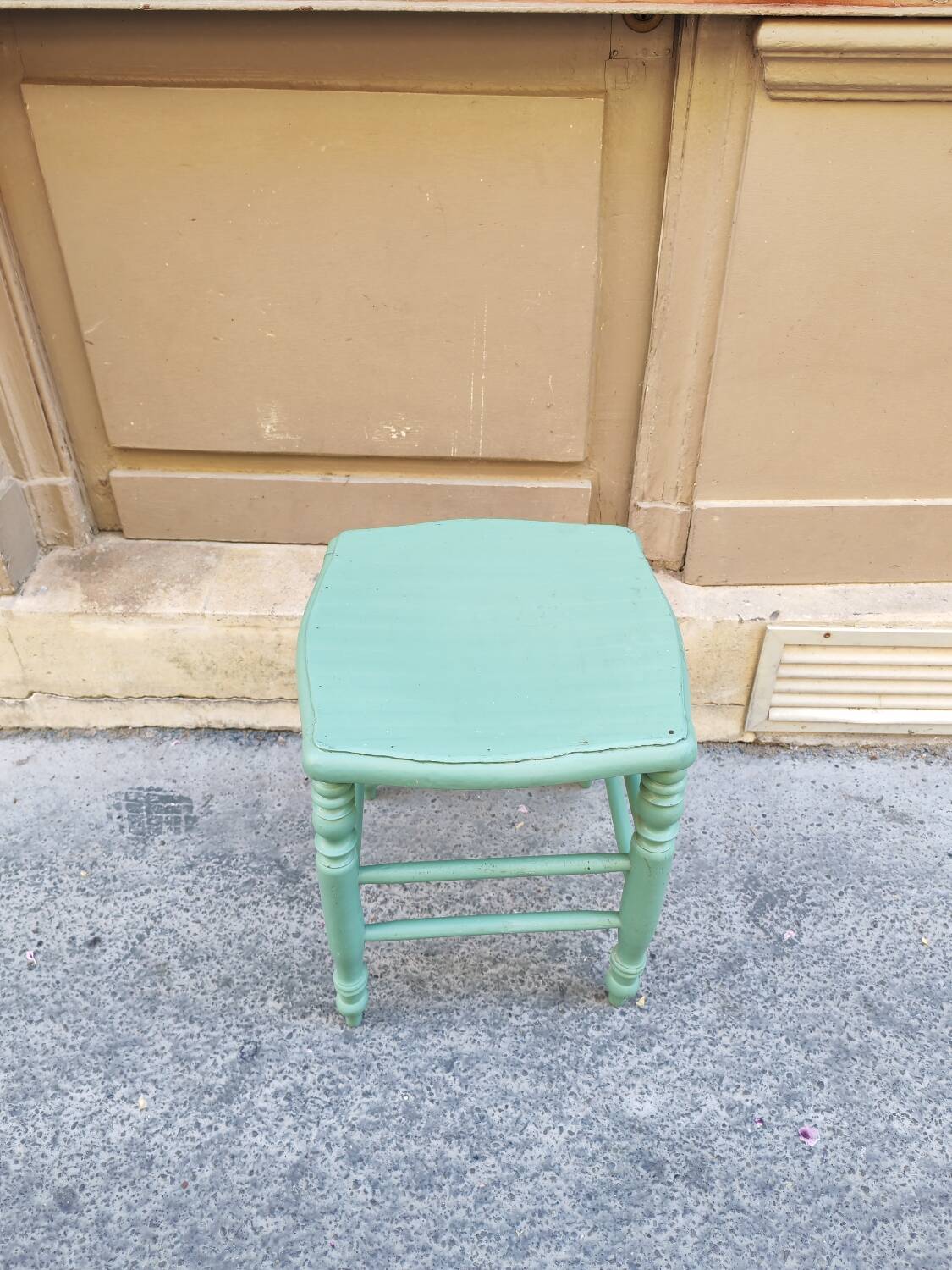 Antique green stool