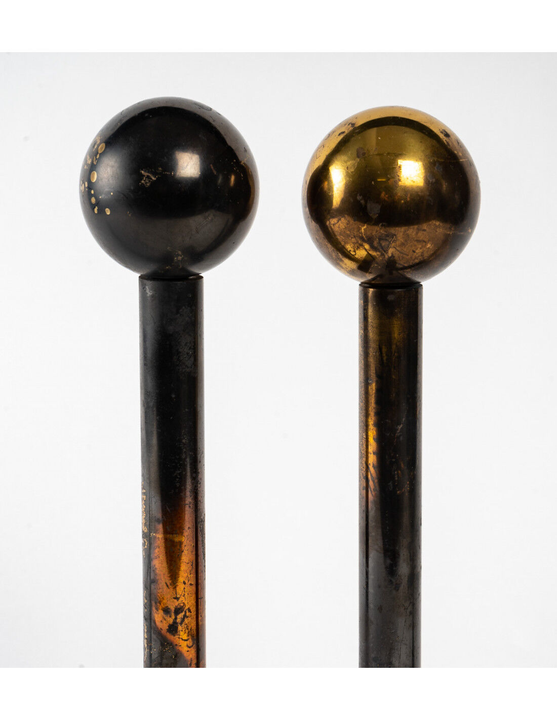 Pair of cast iron and brass chenets, 1960