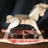 Cheval à bascule avec roulettes
