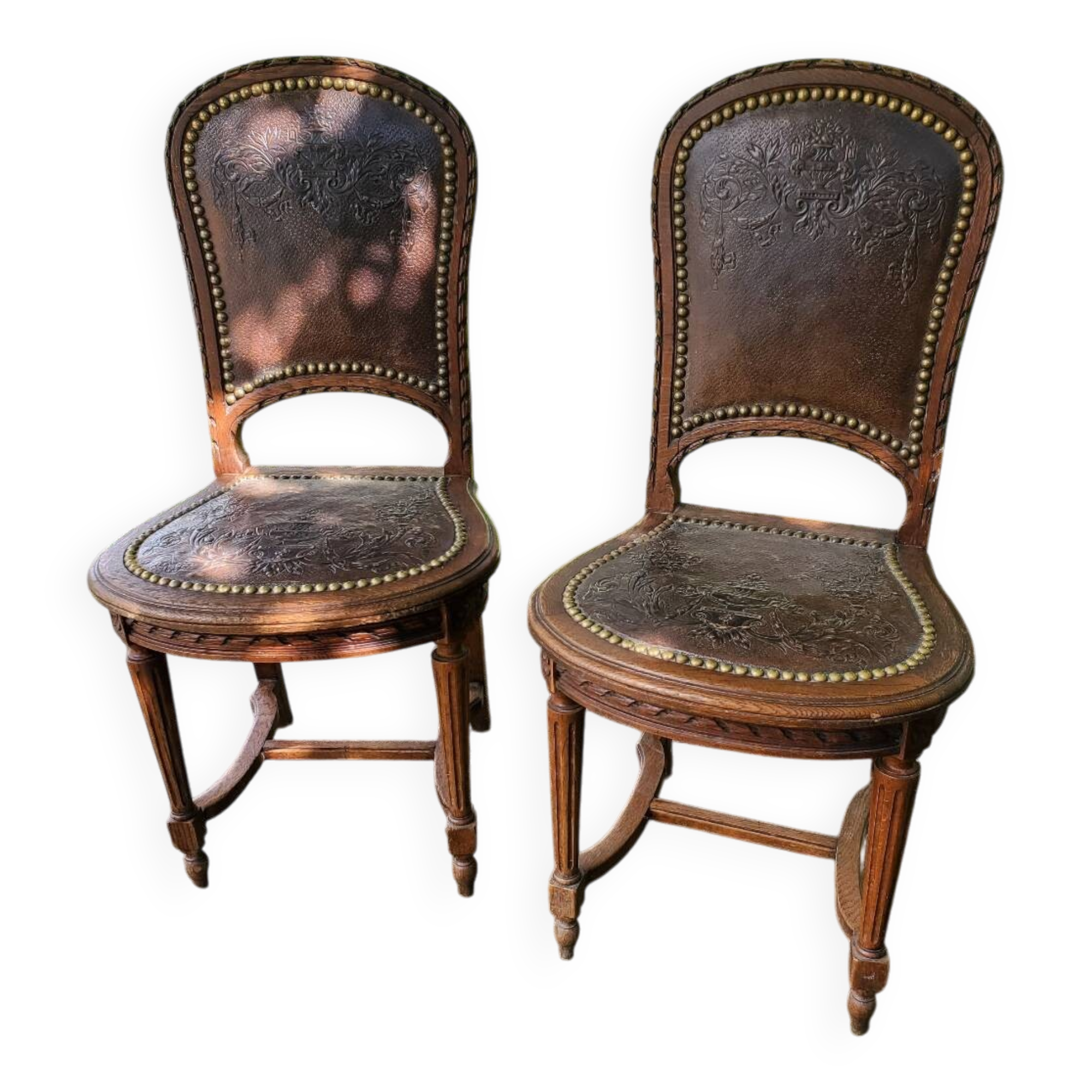 Paire de chaises en chêne et cuir