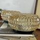 Pair of amber glass ceiling sconces with small vintage flowers.