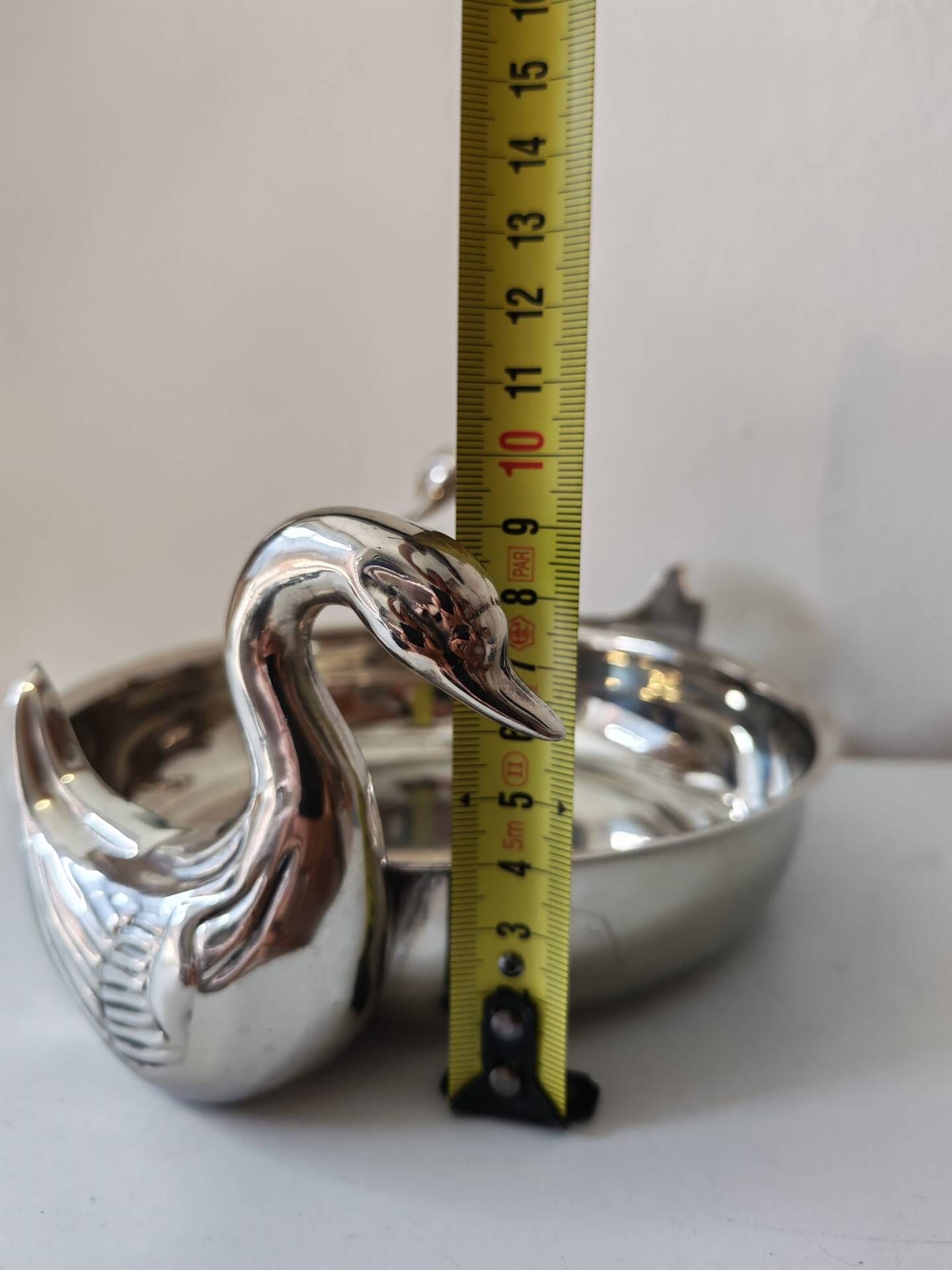 Centrepiece, silver-plated metal swan catchall.