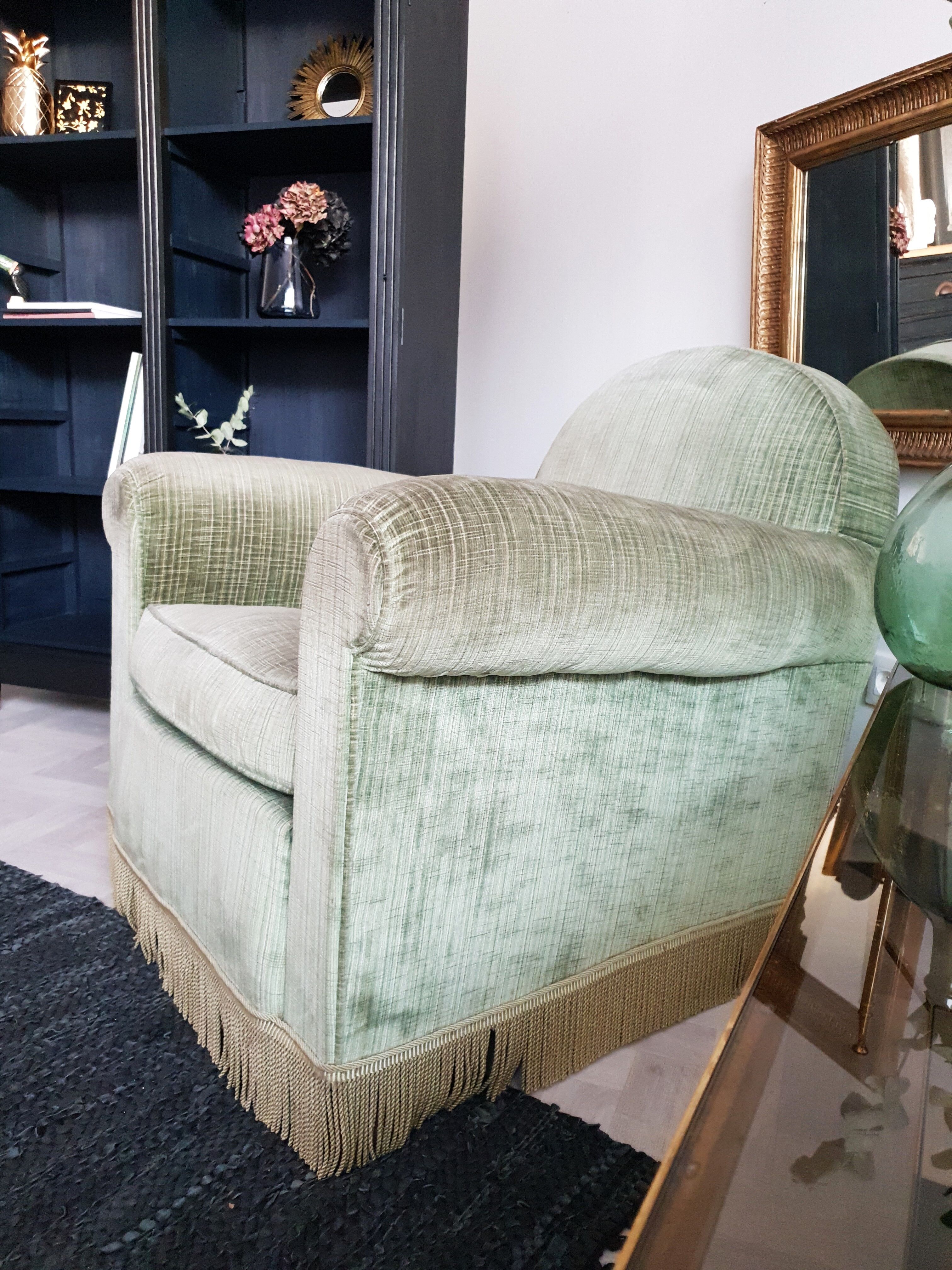 Fringed velvet armchair