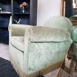 Fringed velvet armchair