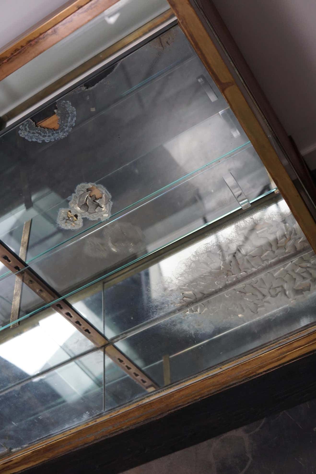 Counter or shop window in oak glass and brass France around 1920